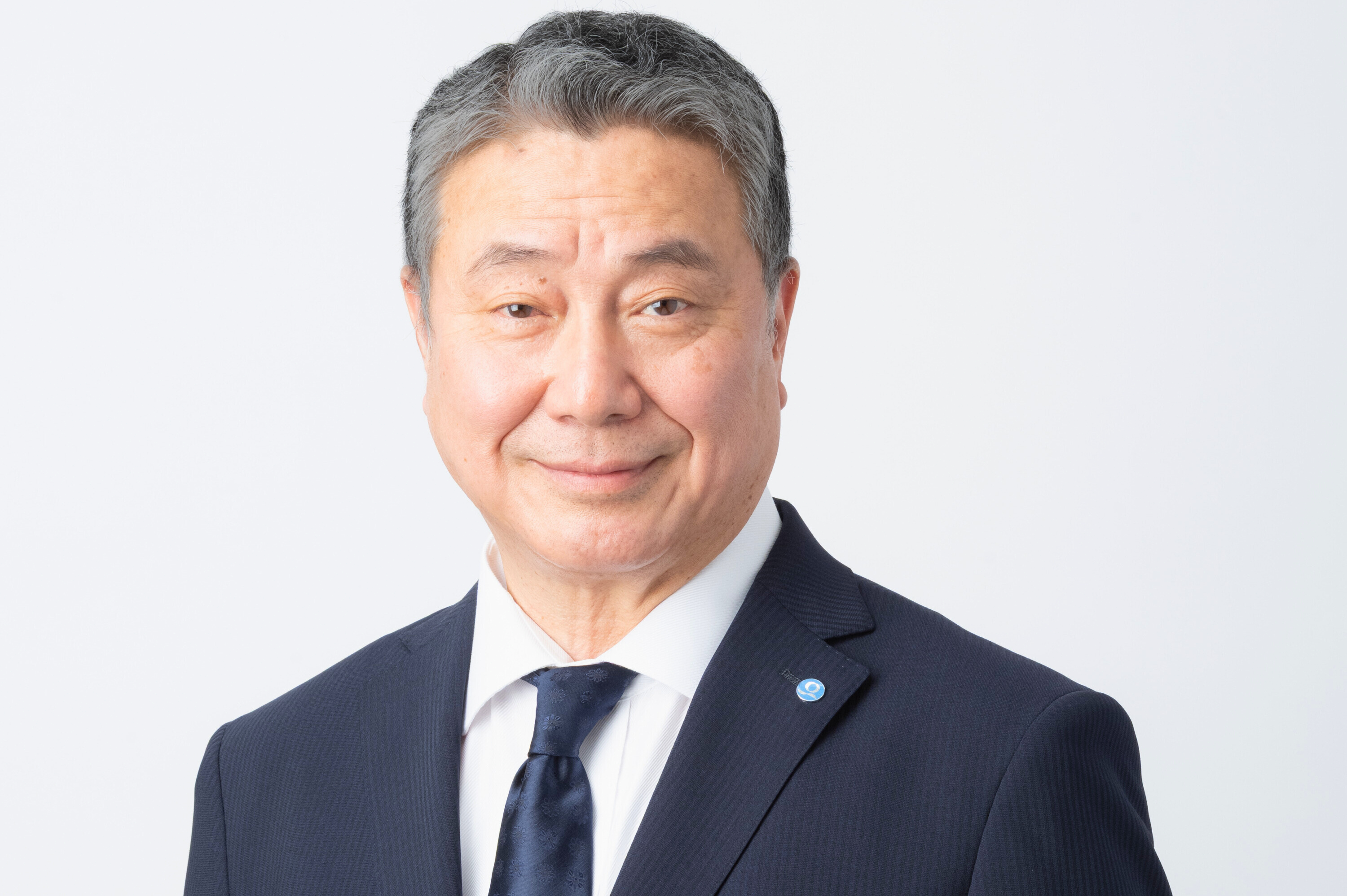 Portrait photo of the President and Representative Director of Japan Cash Machine Co., Ltd.